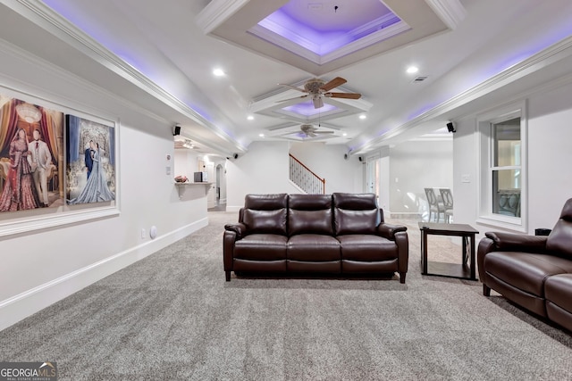 carpeted cinema featuring ceiling fan, crown molding, beam ceiling, and coffered ceiling