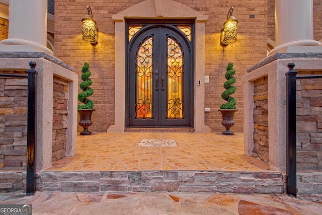 entrance to property with french doors