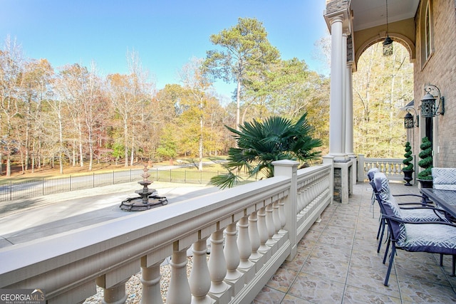 view of patio / terrace with a balcony