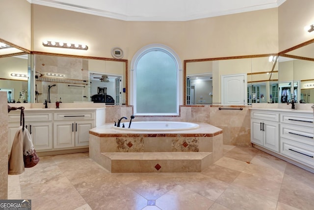 bathroom featuring ceiling fan, crown molding, independent shower and bath, and vanity