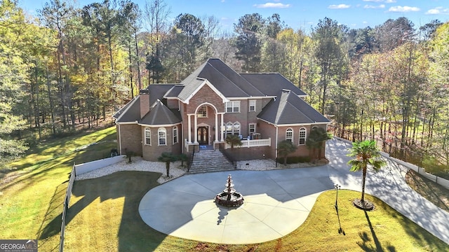 view of front of property with a front lawn