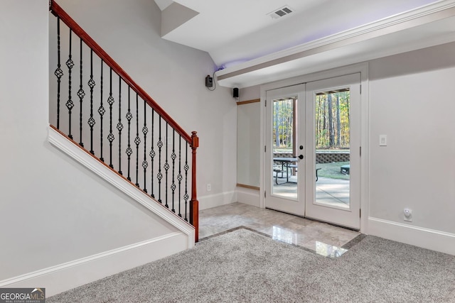 entrance foyer featuring french doors