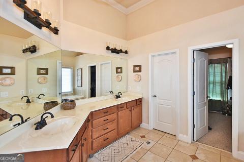 bathroom featuring vanity and tile patterned floors