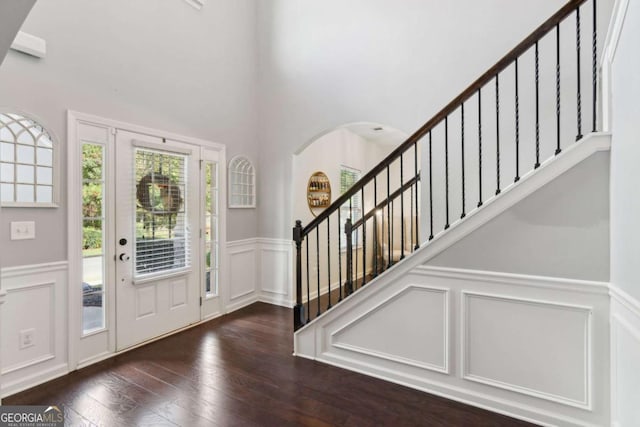 foyer entrance with dark hardwood / wood-style flooring