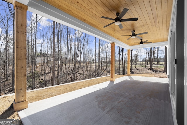 view of patio featuring ceiling fan