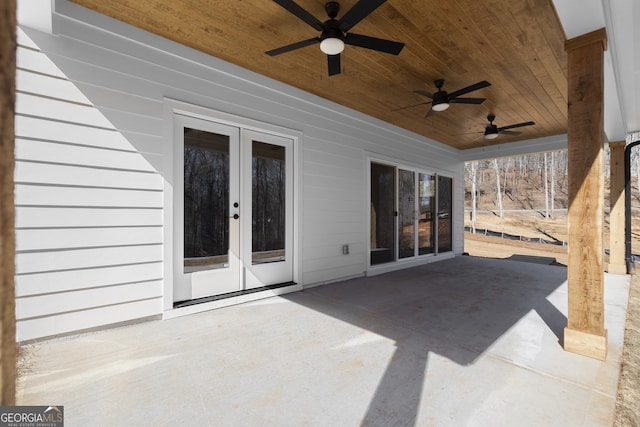 view of patio featuring a ceiling fan and french doors