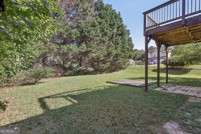 view of yard featuring a deck