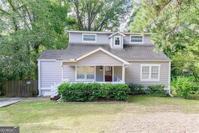 view of front of property with a front lawn and a porch