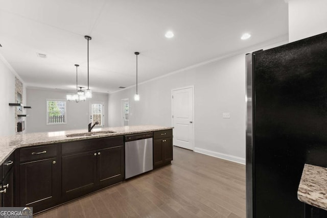 kitchen featuring black refrigerator, ornamental molding, sink, dishwasher, and dark hardwood / wood-style floors