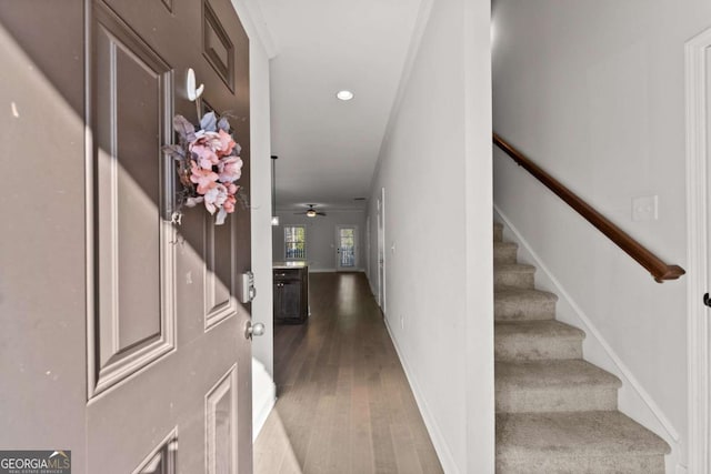 corridor featuring hardwood / wood-style floors