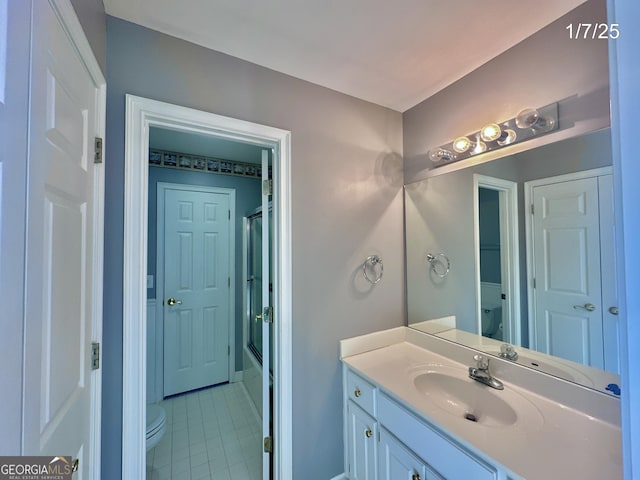 full bathroom featuring tile patterned floors, vanity, shower / tub combo, and toilet