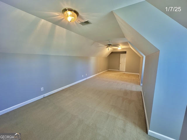 bonus room featuring light carpet, ceiling fan, and lofted ceiling