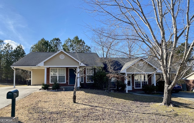 view of front of house with a carport