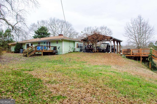 view of yard featuring a gazebo and a wooden deck