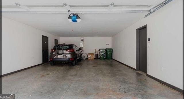 garage featuring a garage door opener