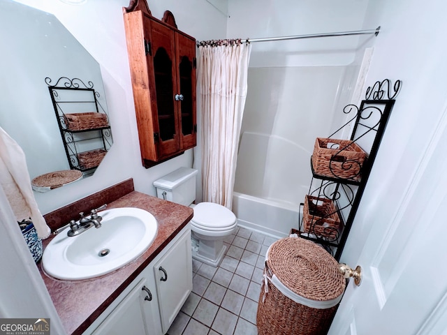 full bathroom featuring shower / bath combo, vanity, toilet, and tile patterned floors