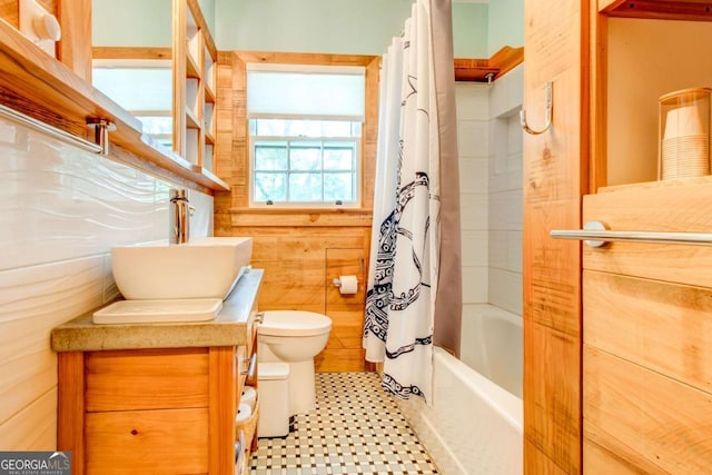 full bathroom with vanity, toilet, and shower / bathtub combination with curtain