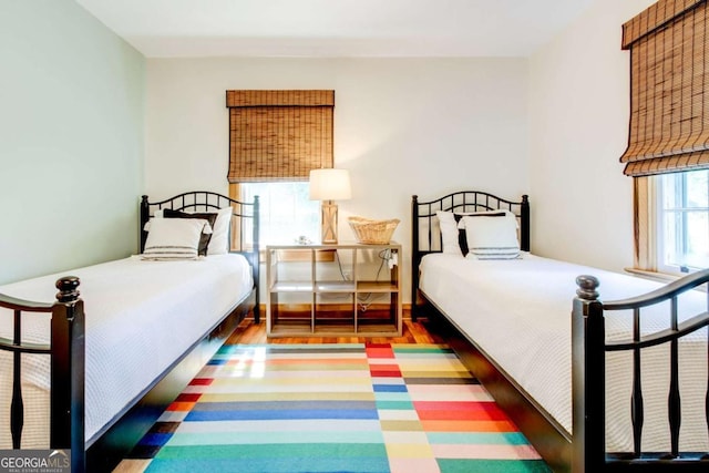 bedroom featuring dark wood-type flooring