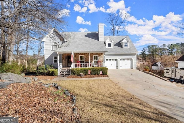 view of front facade with a porch and a garage