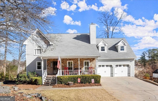 view of front of house featuring covered porch and a garage