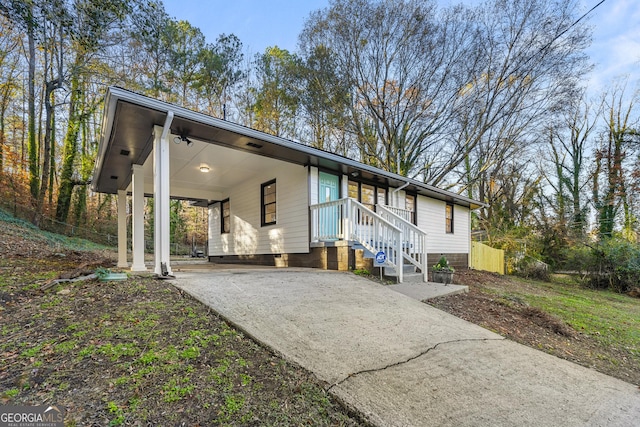 view of front of house with a carport