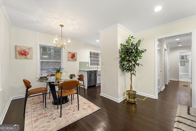 dining space with crown molding, dark hardwood / wood-style flooring, and a notable chandelier