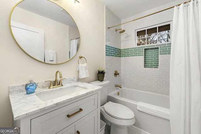 full bathroom featuring vanity, toilet, and shower / bath combo with shower curtain