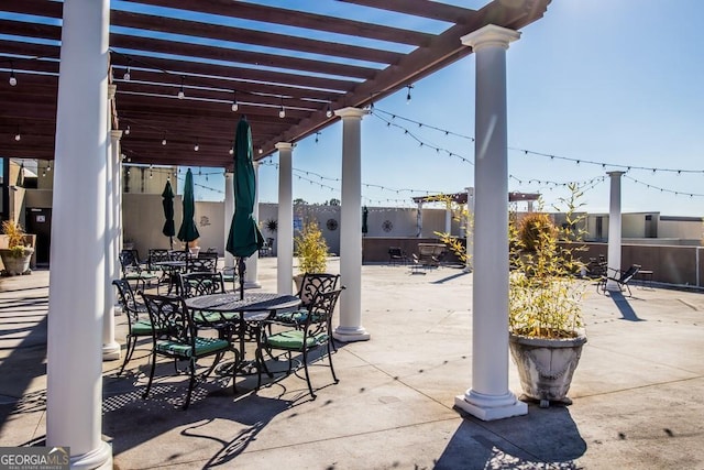 view of patio featuring a pergola