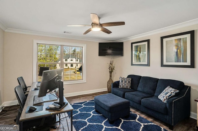 office area featuring dark hardwood / wood-style floors, ceiling fan, and crown molding