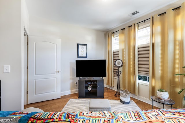 living room with light hardwood / wood-style floors