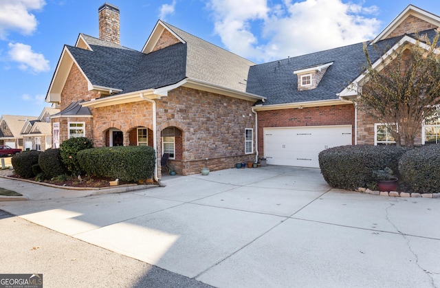 view of front of property with a garage