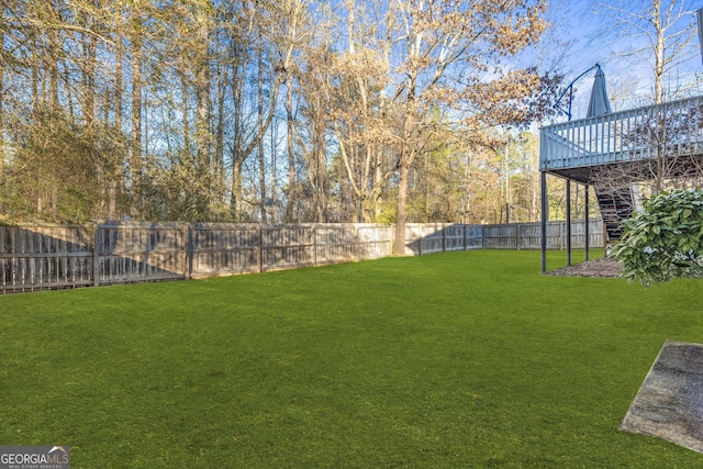 view of yard with a deck