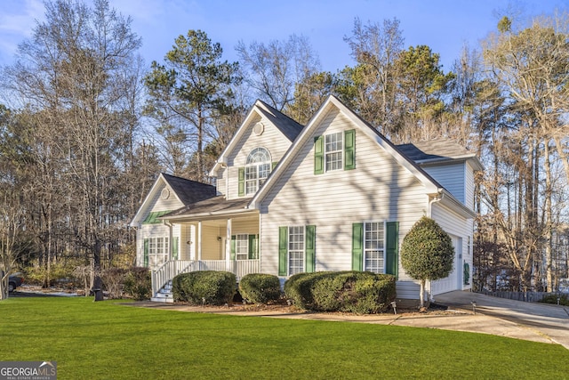 front of property featuring covered porch and a front yard