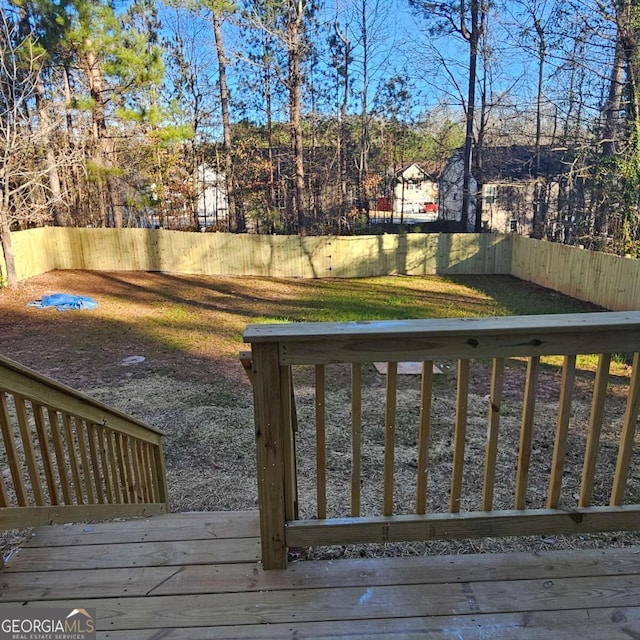 view of yard with a wooden deck