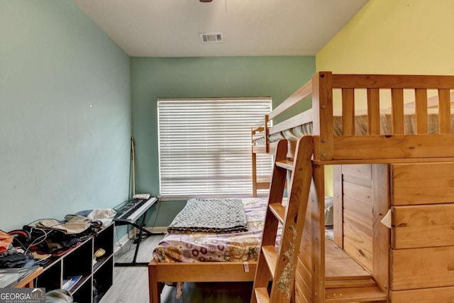 bedroom with light hardwood / wood-style floors