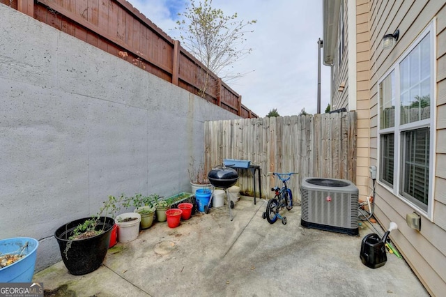 view of patio featuring cooling unit