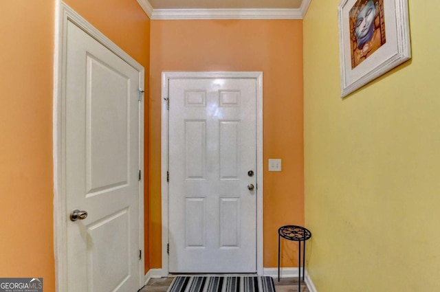 doorway to outside with ornamental molding