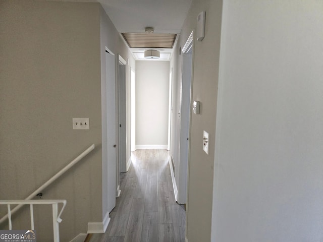 hallway featuring hardwood / wood-style floors