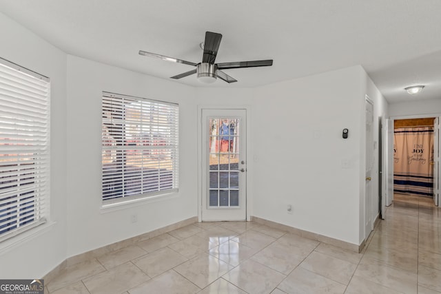 empty room featuring ceiling fan