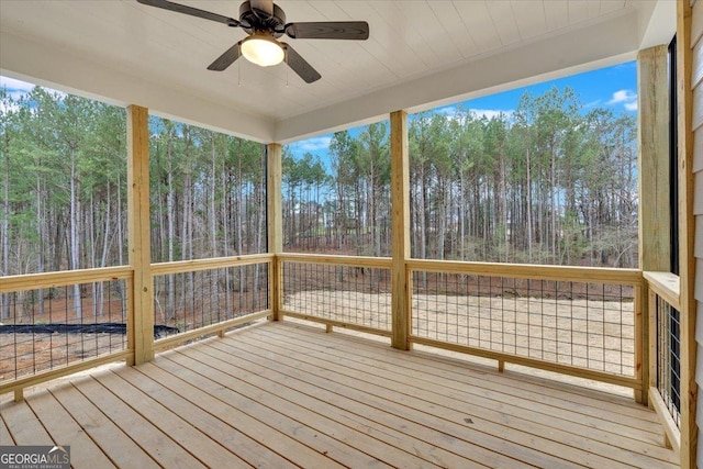 wooden deck with ceiling fan