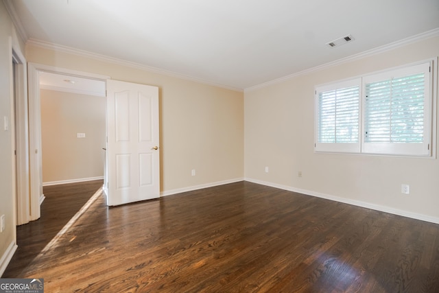 unfurnished room featuring dark hardwood / wood-style flooring and ornamental molding