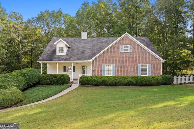 view of front of home with a front lawn and a porch