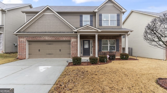 craftsman-style house featuring a front yard