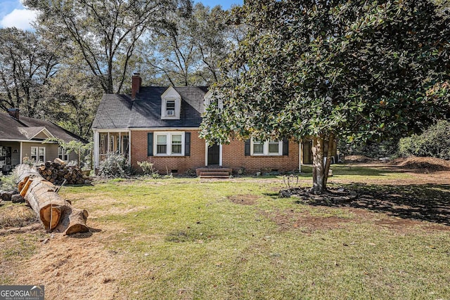 view of front of home featuring a front yard