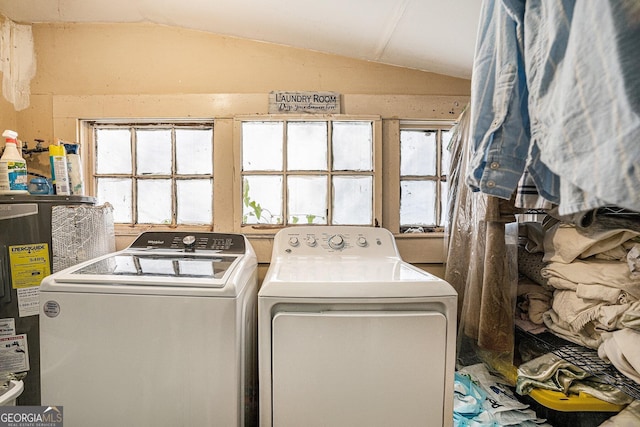 laundry area featuring independent washer and dryer and water heater