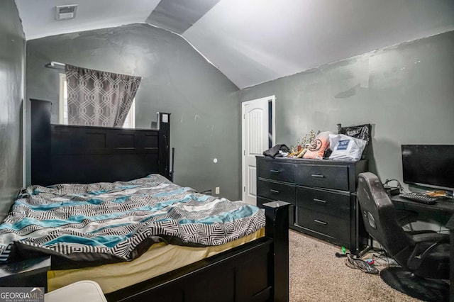 carpeted bedroom featuring vaulted ceiling