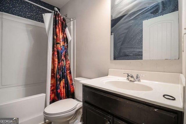 full bathroom featuring vanity, toilet, and shower / tub combo