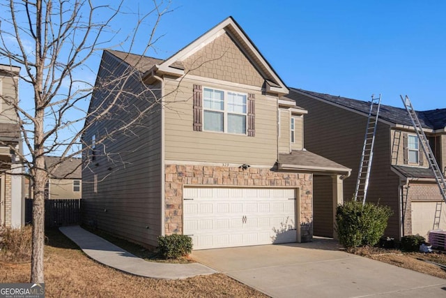 view of side of property with a garage