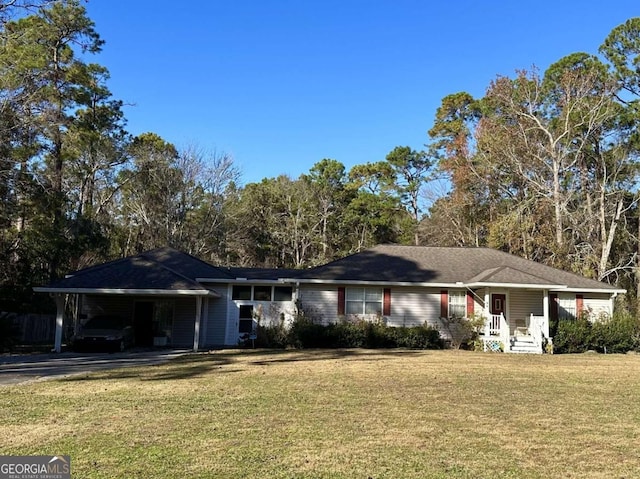 single story home with a front yard and a carport