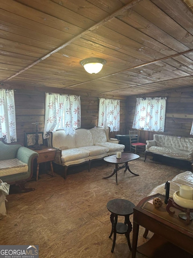 living room with wooden ceiling and wooden walls